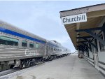 The iconic Churchill Station sign blends in well with the iconic VIA Rail Budd HEP rolling stock 